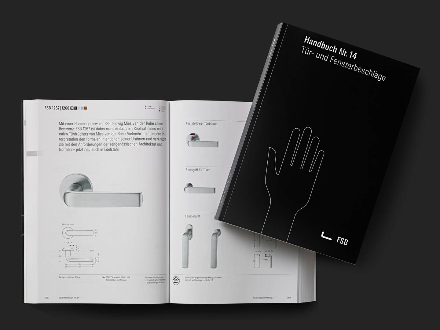 Aufgeschlagener FSB Produktkatalog mit Edelstahlgriffen und technischem Layout. Hochwertiges Designmotiv für Architektur-,und Markenkommunikation.