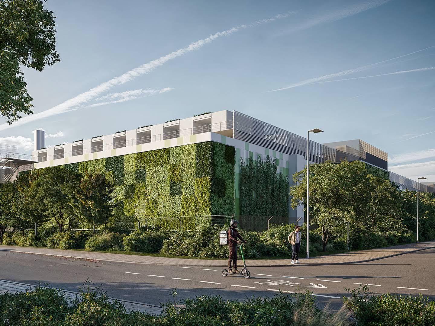 Modernes Gebäude mit vertikaler Grünfassade bei sonnigem Wetter